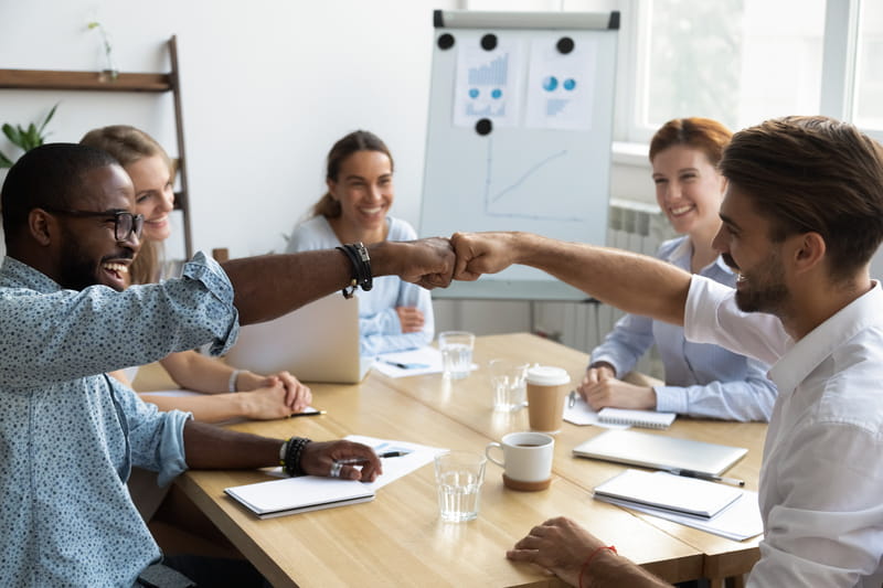 Close-up of employees engaged in a brainstorming session